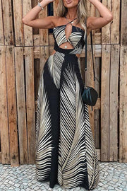 Tropical Palm Leaf Print Cutout Elastic Waist Flare Jumpsuit